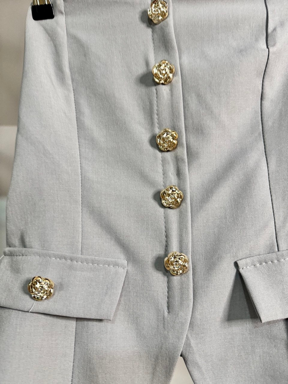 Top golden buttons grey