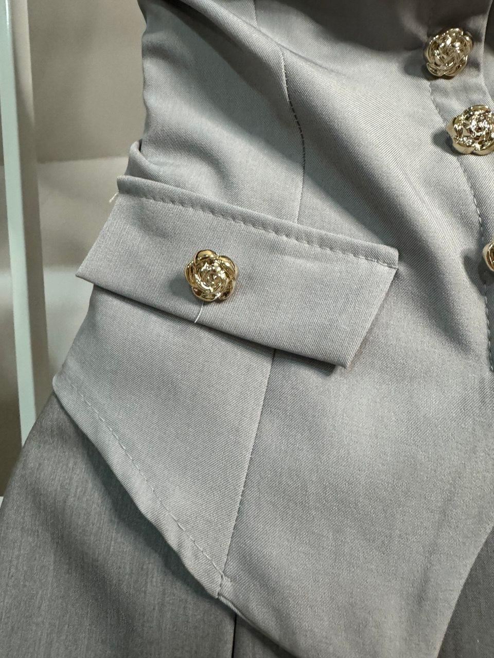 Top golden buttons grey