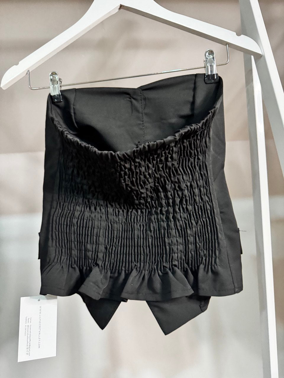 Top botones dorados negro
