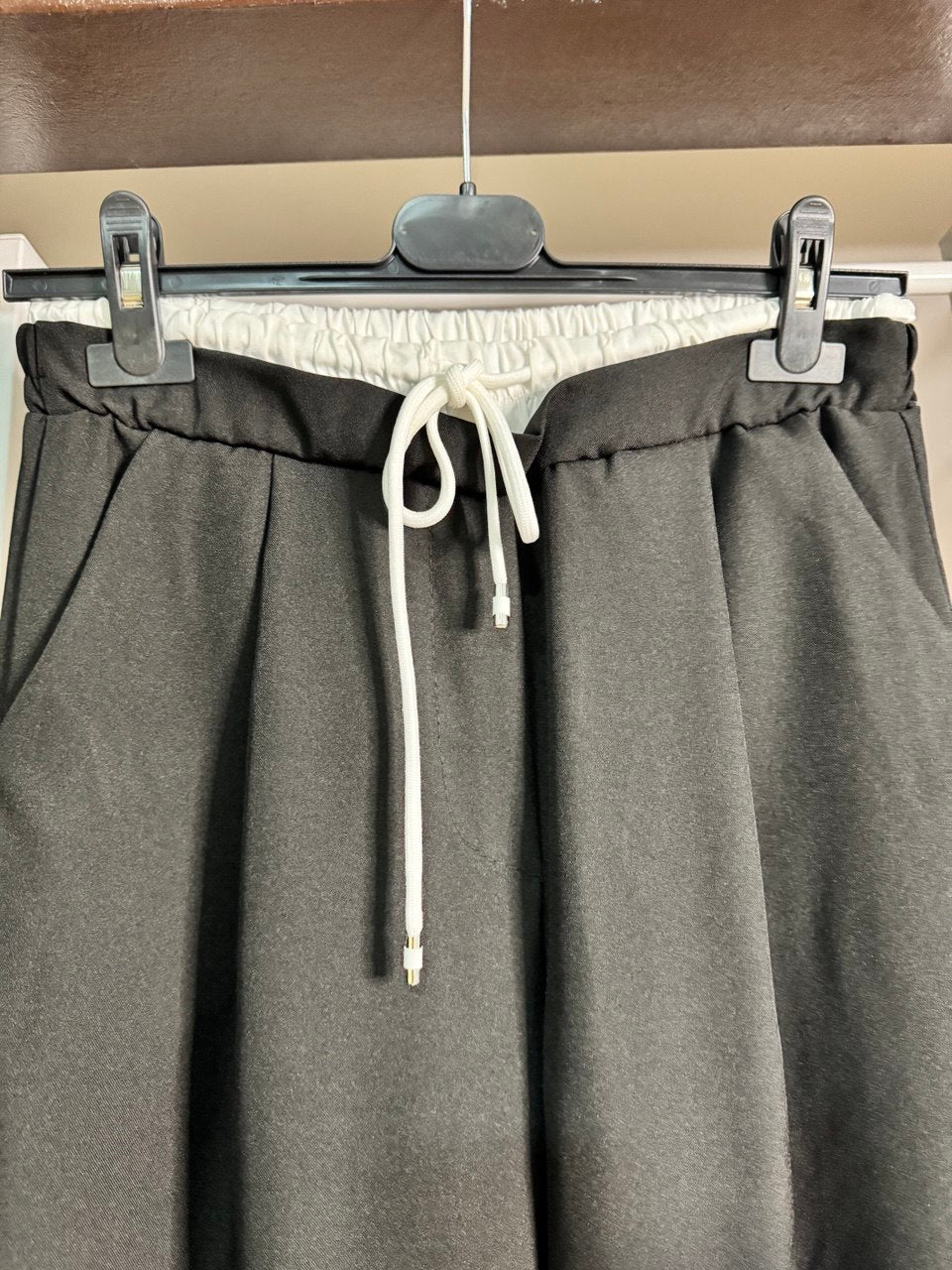 Conjunto chaqueta y pantalón palazzo