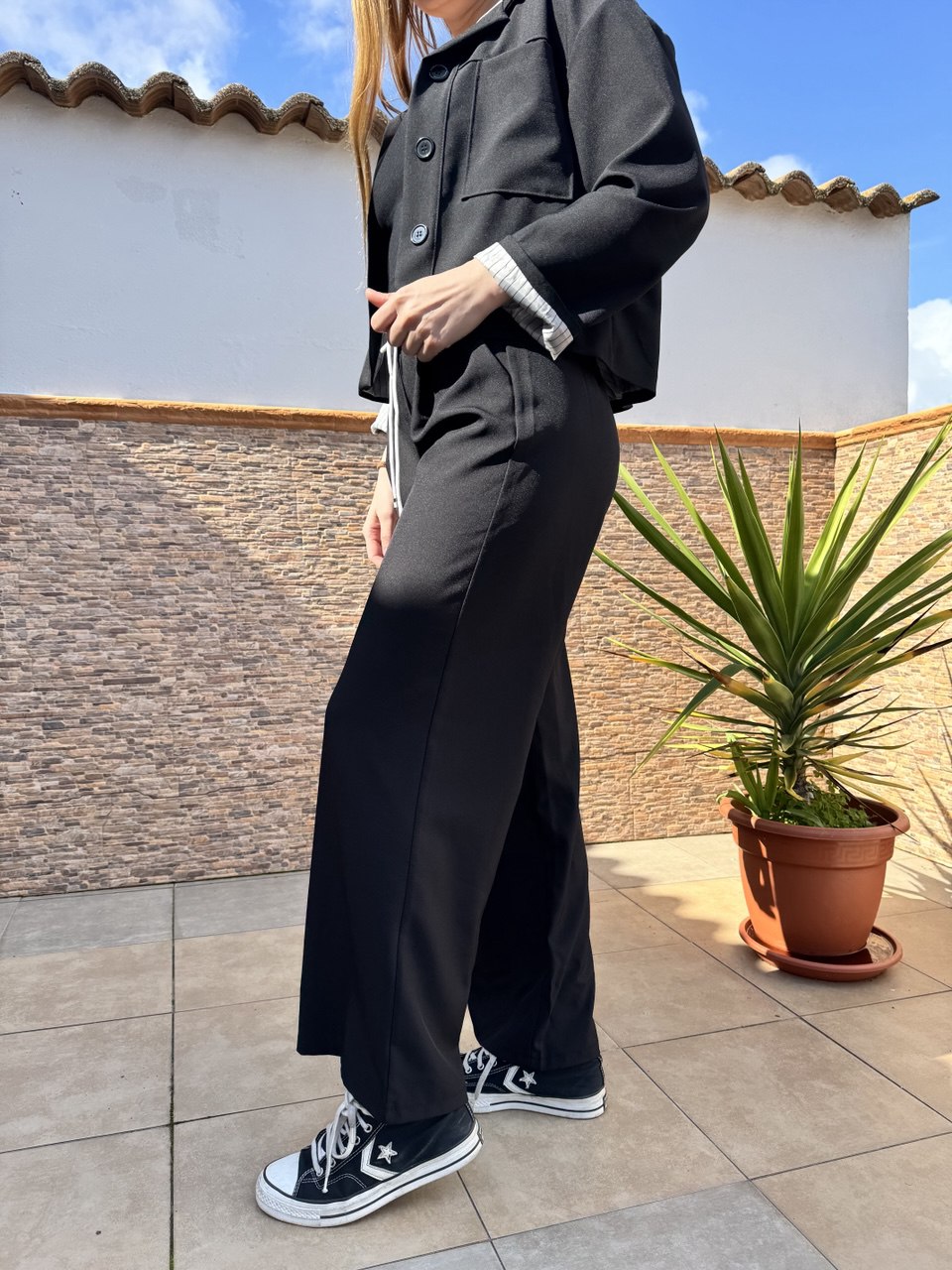 Conjunto chaqueta y pantalón palazzo