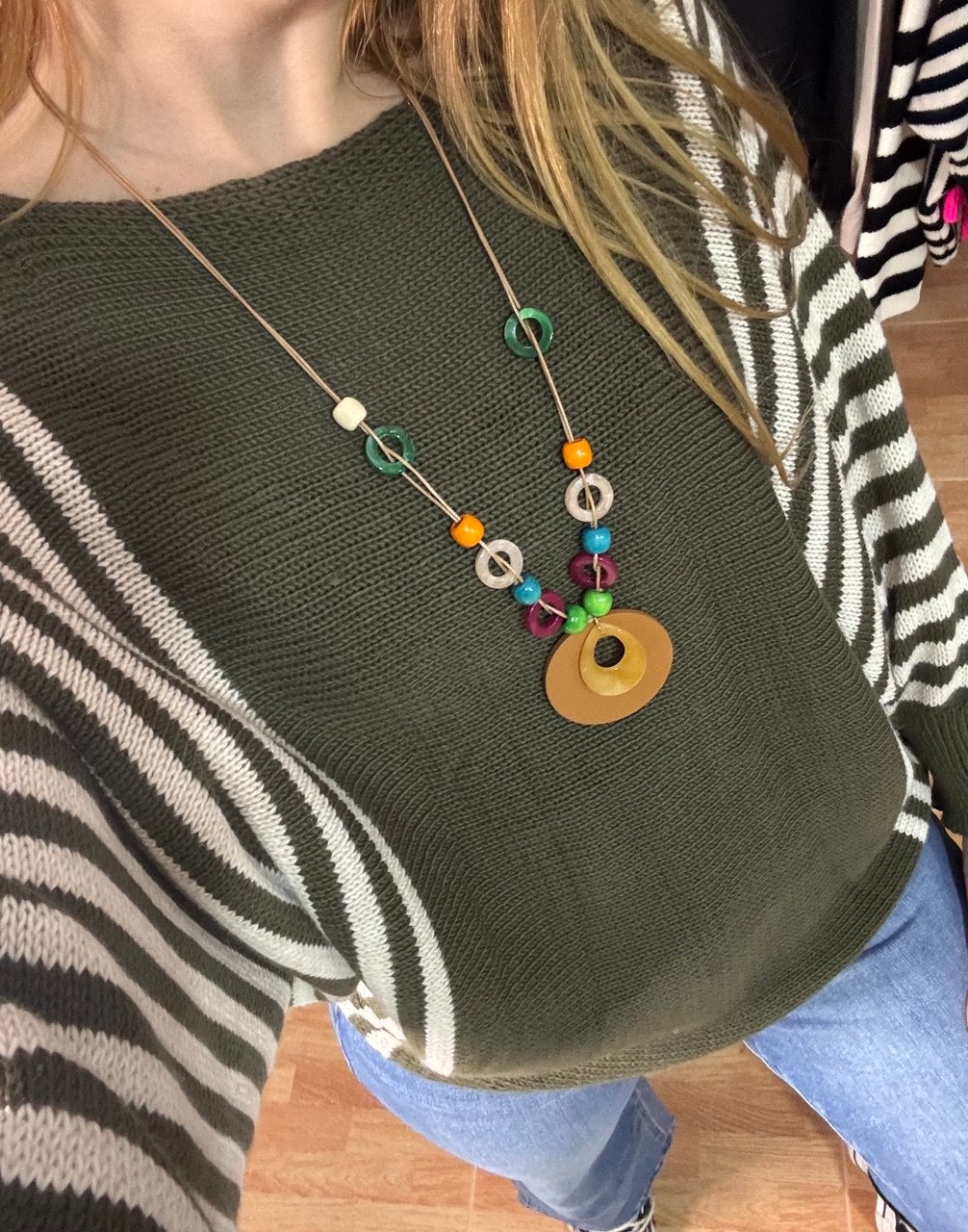 Jersey oversize de rayas verde con colgante