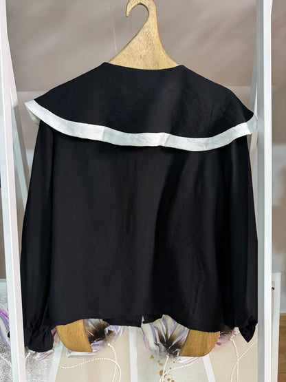 Camisa cuello bobo negra