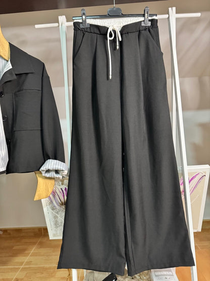 Conjunto chaqueta y pantalón palazzo