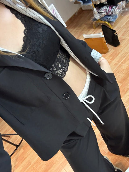 Conjunto chaqueta y pantalón palazzo